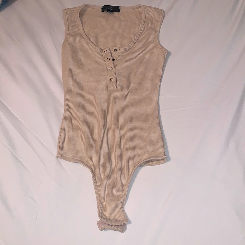 Cream bodysuit with snap bottom